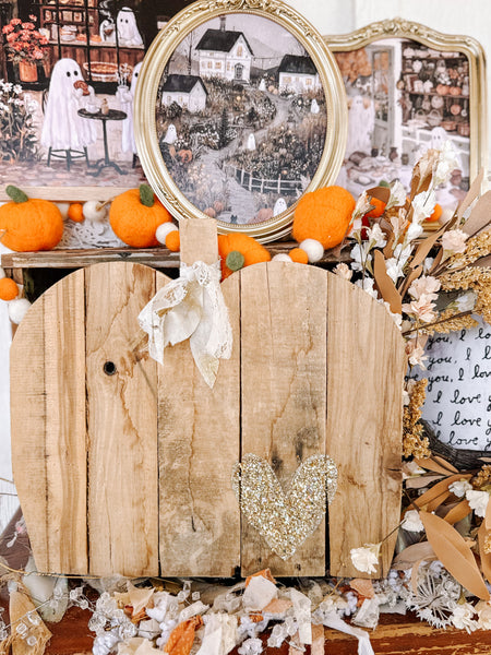 Olivewood’s 15” rustic wood pumpkin.
