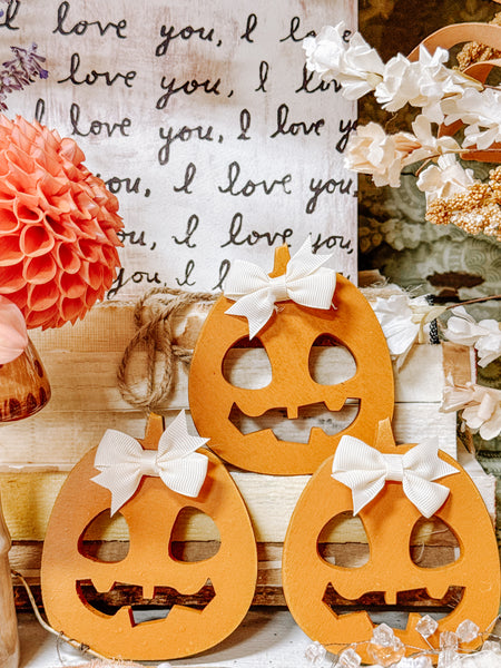 Olivewood’s 4” Jack o’ Lantern pumpkin.